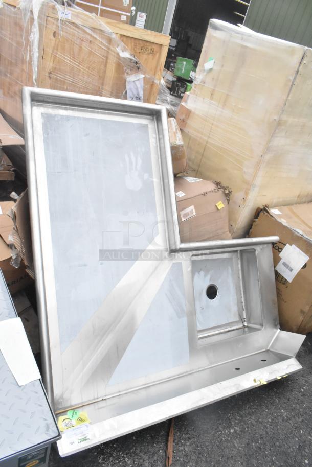 BRAND NEW SCRATCH AND DENT! Regency 600DDTI60R 5' 16-gauge stainless steel L-shape dishtable, right island, slight dents.