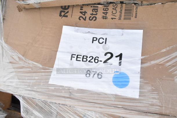 Pallet of five brand new scratch and dent items including a work table and shelf, visible packaging label "PCI FEB26-21 876".