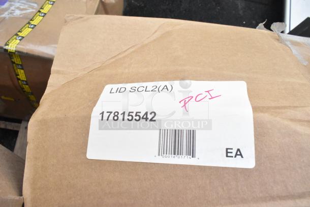 Brown cardboard box labeled "LID SCL2(A) PCI" with barcode 17815542, showing signs of handling. Part of 15 scratch and dent items.