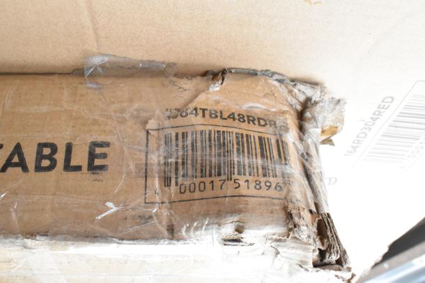 Cardboard packaging showing barcode and printed markings. Box shows signs of wear, labeled "364TBL48RDR5".