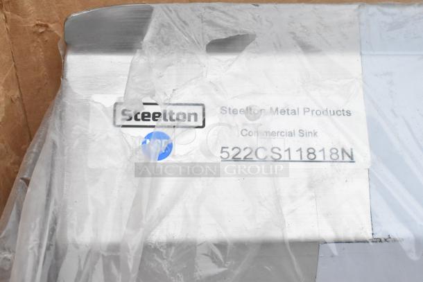 Steelton Metal Products commercial sink with label "522CS11818N." Item is brand new with minor scratches.