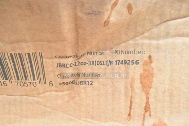 Brown cardboard with item details: "Captivator Item Number: JBRCC-12oz-38(DS1.5)/PF 7749256, Clark Item Number: #500DSJBR12."