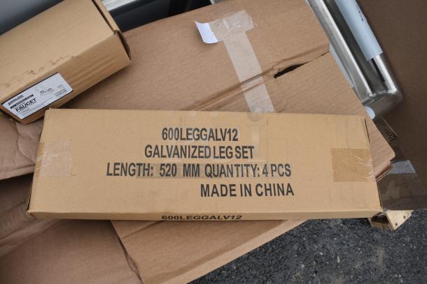 Box labeled "600LEGGALV12 Galvanized Leg Set," containing 4 pieces, 520 mm each, for Regency 600S31416212 3 Bay Sink.