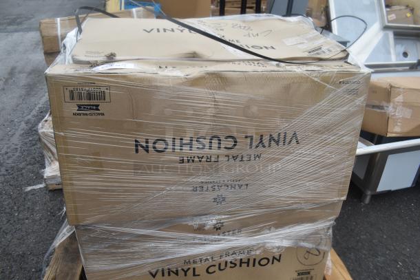 Box of 5 brand new scratch and dent items with vinyl cushions, wrapped in plastic. Labels indicate "Metal Frame Vinyl Cushion."