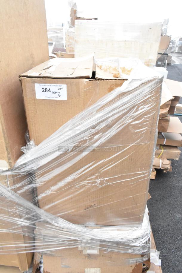 Paletted boxes wrapped in plastic, labeled with "284 Approx QTY 6" tag. Scratch and dent items including pie pans, work table.