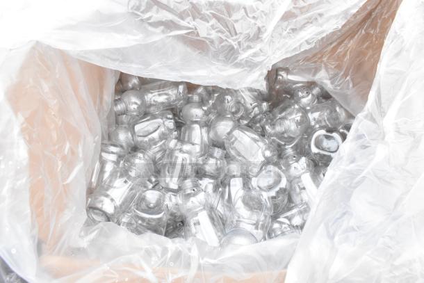 Bag of clear plastic bottles, unopened, suitable for various uses. Brand new condition, part of auction item set.