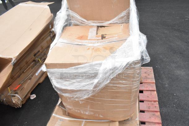 Cardboard boxes on a pallet wrapped in clear plastic, labeled "ITEM#60-PR183X," containing scratch and dent items.