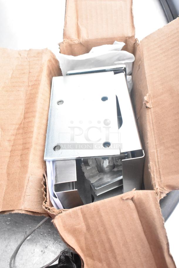 Box containing metal hardware for 2 swinging kitchen doors, in new condition. Includes hinges and mounting plates.