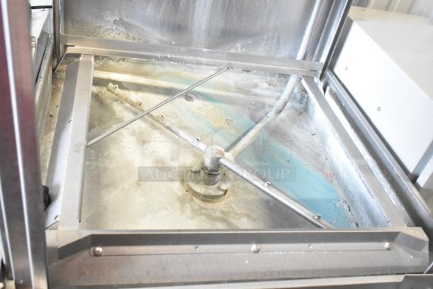 Noble CONSERVER XL low temp pass-through dishwasher interior. Visible wear, suitable for commercial use. 115V, 1 Phase.