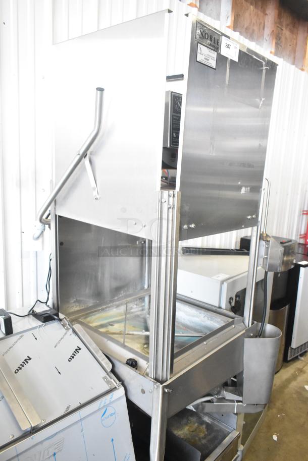Noble CONSERVER XL commercial pass-through dishwasher, low temp, 115V, 1 phase. Stainless steel finish, visibly used.