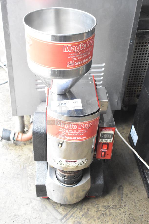 Magic Pop DMP-1 metal rice cake machine, 115 volts, 1 phase, visible brand labels, and digital temperature display.