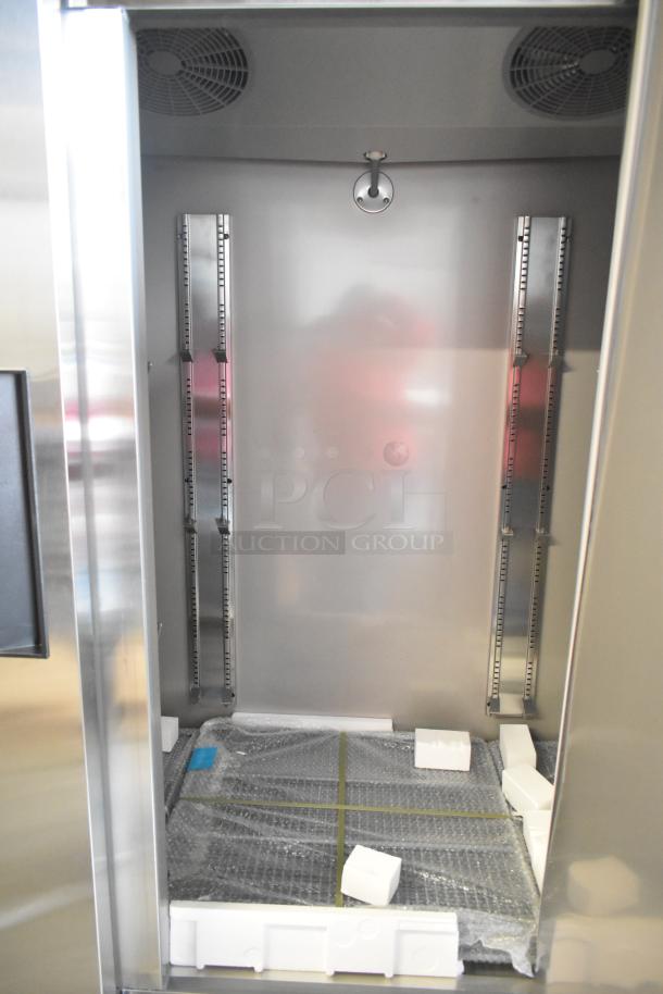 Brand new KoolMore RIF-3D-SS commercial 3-door reach-in freezer, 72 cu ft, 115V, scratch and dent condition, interior view.