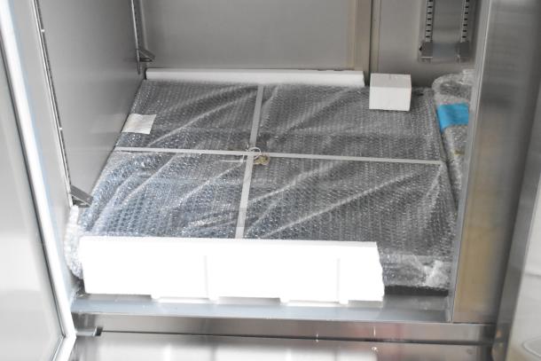 Brand new KoolMore RIF-3D-SS commercial 3-door freezer, 72 cu ft, 115V, 1 Phase, scratch and dent, wrapped in bubble wrap.