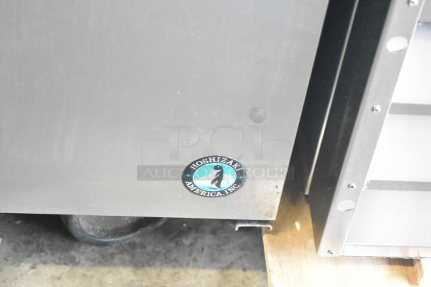 Hoshizaki CRMR60-24M commercial prep table, stainless steel, Hoshizaki logo, on casters, 115V, 1-phase.