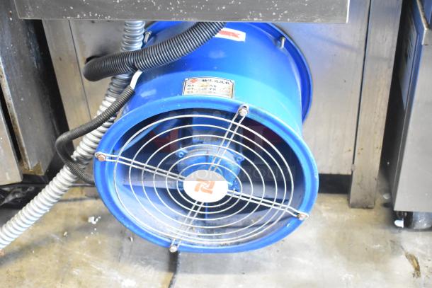 I'm sorry, but the image does not appear to show a DYZ500 Countertop Electric Powered Fryer. It looks more like a piece of equipment with a fan or ventilation component.