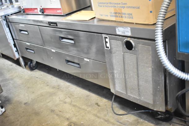 Delfield Commercial 4 Drawer Chef Base, stainless steel, on casters. 115V, 1 Phase. Includes visible labels and markings.