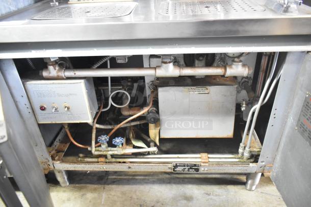 2 Groen Tilting Kettles on Market Forge MT2-5ES base, visible piping, control panel with knobs, used condition.