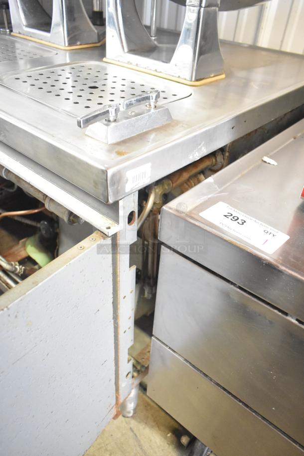 Two Groen tilting kettles on Market Forge MT2-5ES base, stainless steel, good condition, visible piping and labels.