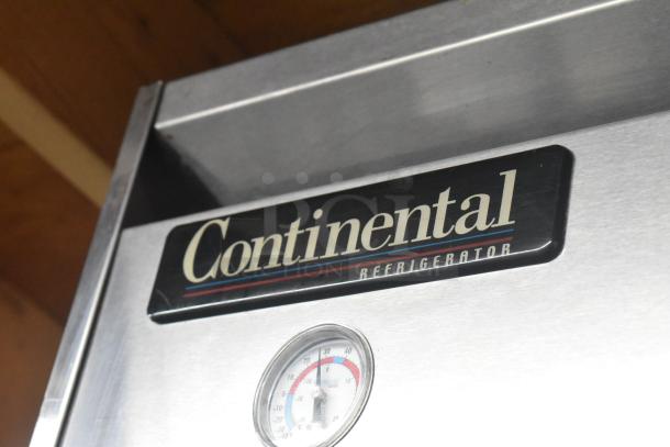 Continental 1R-HD commercial reach-in cooler, stainless steel, thermometer visible, on casters, 115 volts, 1 phase.