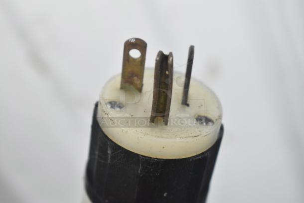 Close-up of a plug prong, part of the Scotsman C0830SA-32B Commercial Ice Machine Head, 208/230 Volts, 1 Phase.