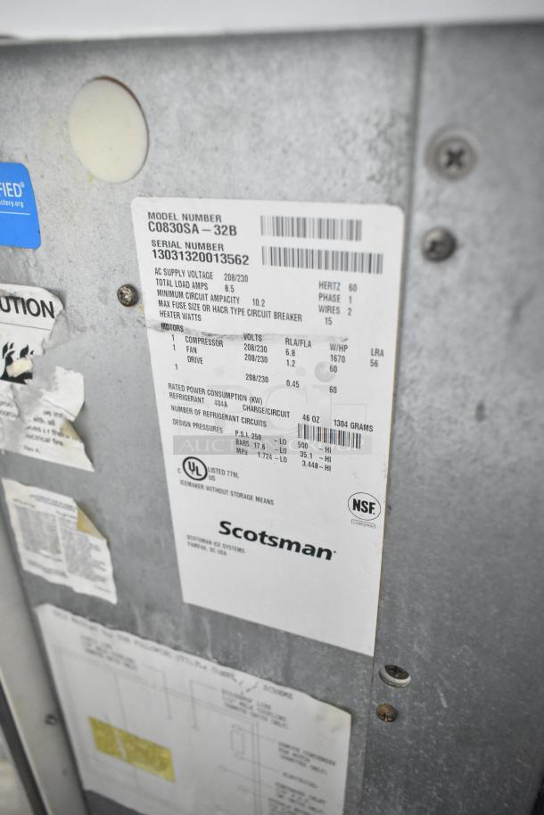 Scotsman C0830SA-32B commercial ice machine head label. 208/230 volts, 1 phase. UL and NSF certified.