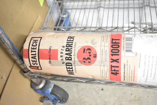SEALTECH 4' x 100' Premium Weed Barrier Fabric ST-101-4X100, 3.5 oz, in packaging on a metal shelf.