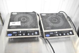 Two Globe IR1800 single burner induction ranges, 2022 model, electric, 120 volts, visible wear, digital controls, metal finish.