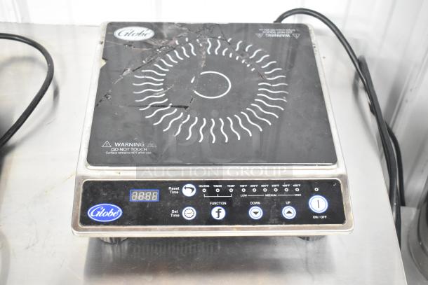 Globe IR1800 single burner induction range, 120V, countertop model, visible controls and branding, worn condition.