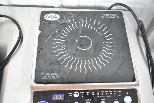2022 Globe IR1800 induction range, single burner, scratches on surface. Electric-powered, 120V, 1 phase. Warning label visible.