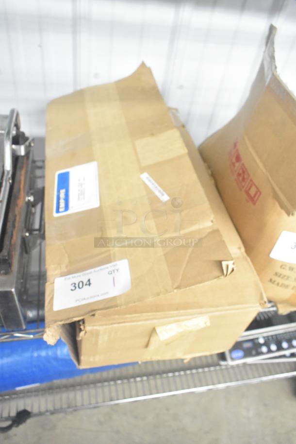 Scotsman Pentair SSM Plus Water Filtration System in a worn cardboard box, labeled with item number 304.