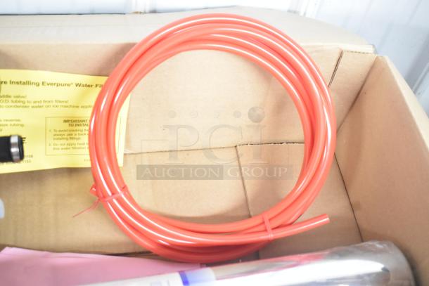 Scotsman Pentair SSM Plus Water Filtration System in box; includes red tubing, document, and components. Excellent condition.