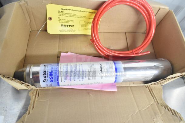Scotsman Pentair SSM Plus Water Filtration System in packaging, includes installation instructions, tubing, and filter cartridge.