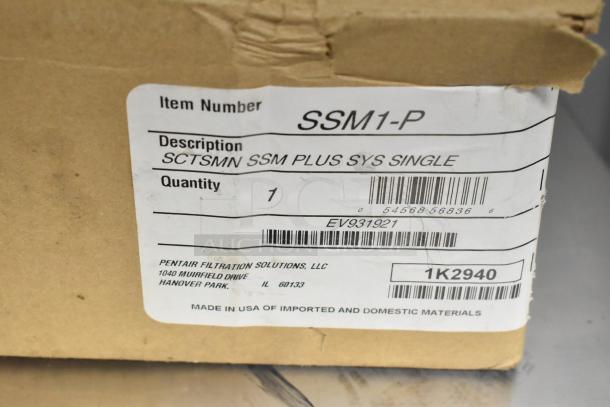 Scotsman Pentair SSM Plus Water Filtration System in box. Label reads "SSM1-P" with item details and barcode visible.