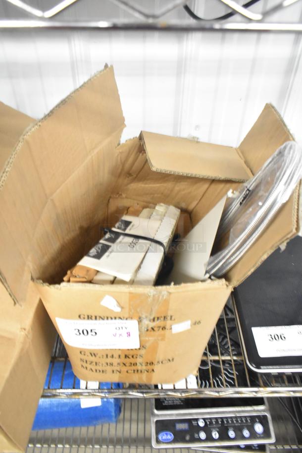 Cardboard box with 8 items, including Lincoln Redco 0653 Tomato Blade Assy, spray nozzle. Box label indicates "Qty: 8".