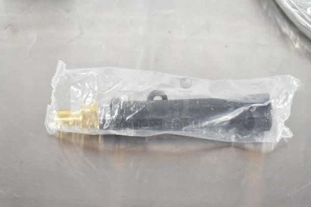 Plastic-wrapped spray nozzle with black handle and brass fitting, part of 8-item auction lot including Lincoln Redco Tomato Blade Assy.