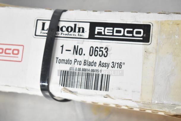 Lincoln Redco 0653 Tomato Blade Assy box, label shows "Tomato Pro Blade Assy 3/16" and barcode, indicating item specs.