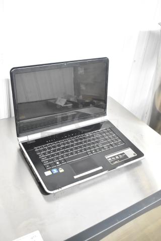 Gateway KAYF0 Laptop with black keyboard, touchpad, and a large display. Appears in used condition, ports visible.