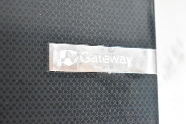 Gateway KAYF0 Laptop featuring a hexagonal pattern design. Visible Gateway logo on the sleek surface.