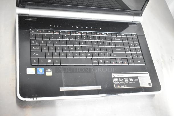 Gateway KAYF0 laptop with Intel Core, Windows 7, Dolby sound stickers, moderate wear. Includes trackpad and full keyboard.