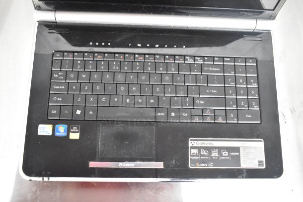 Gateway KAYF0 Laptop, showing keyboard and touchpad. Features Intel Centrino, Windows 7, and Dolby labels. Good condition.