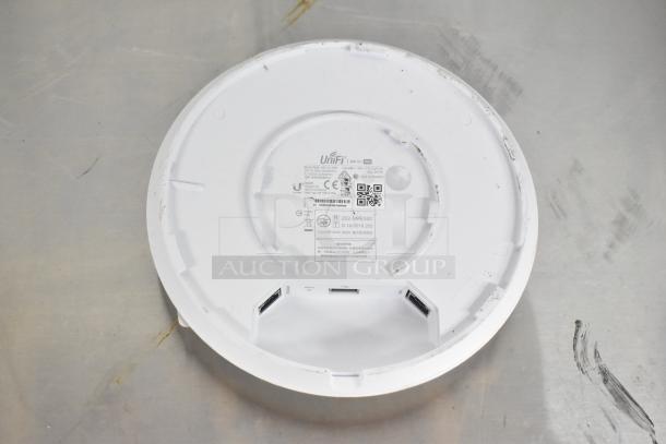 UniFi UAP-AC-PRO WiFi Access Point, underside view with ports and labels visible, used condition.