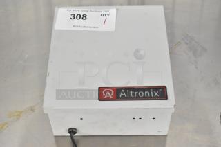 Altronix BH12DC8CB power supply box, metal case, visible brand label on front, auction tag with lot number 308.