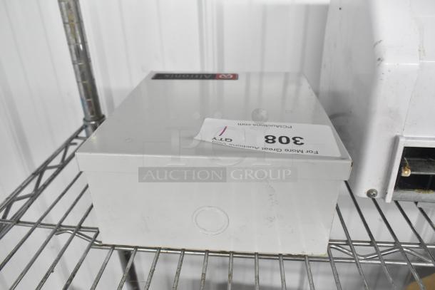 Altronix BH12DC8CB power supply box in metal enclosure, minor surface marks, auction tag labeled "308."