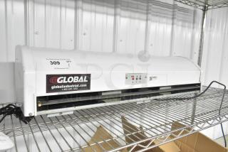 Global 246608 36" air curtain, 120 volts, 1 phase, with visible control panel and Global branding; appears in good condition.
