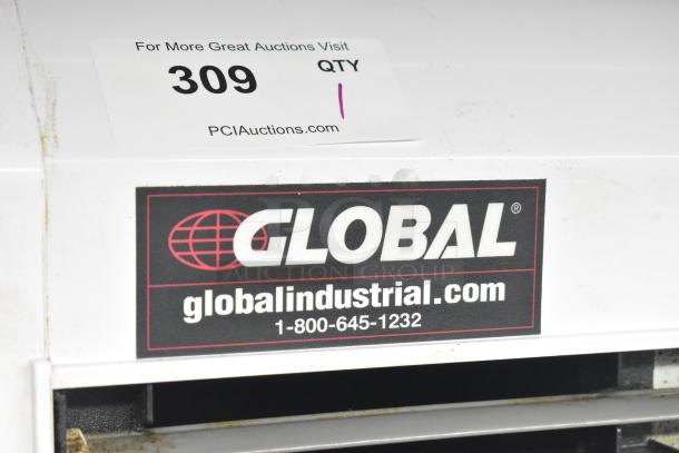 Global 246608 36" air curtain, 120 volts, 1 phase, in used condition. Features visible brand label.