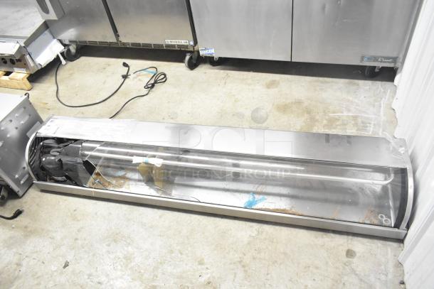 Hoshizaki HNC-180BA-L-SLH refrigerated sushi display case with curved glass and visible wiring, used condition.