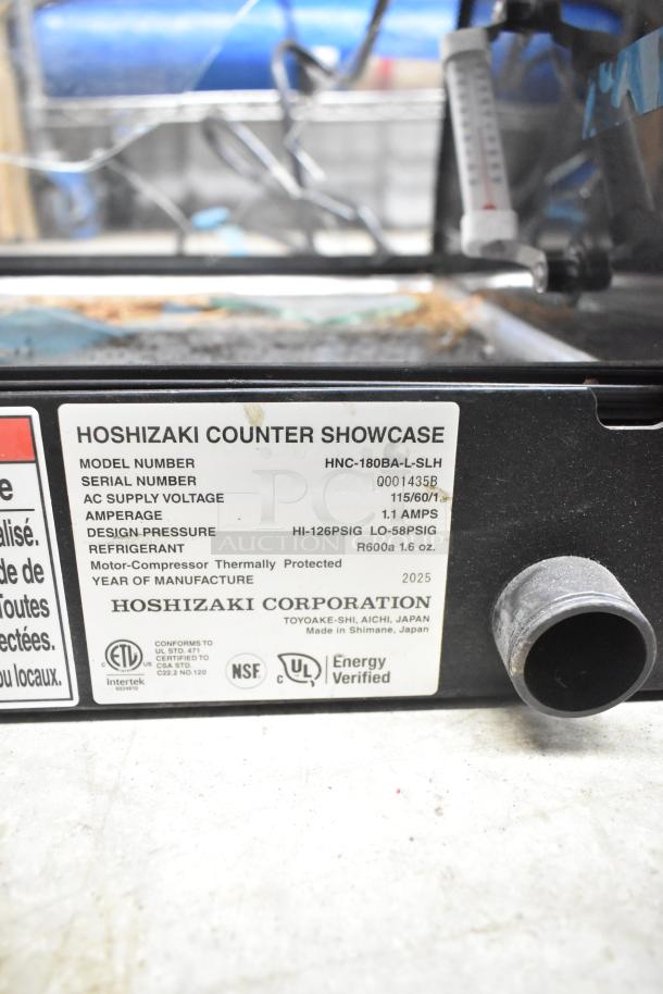 Hoshizaki HNC-180BA-L-SLH sushi display case, 115V, 1 phase. Features include curved glass, thermal protection, and energy verification.
