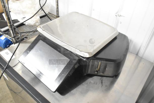 2017 Hobart HTi-LH26 commercial countertop food portioning scale, tested working. Features digital display, metal top.