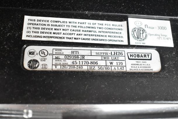 Hobart HTi-LH26 metal commercial countertop food portioning scale, 120/208-240V, tested, FCC compliant, model label shown.