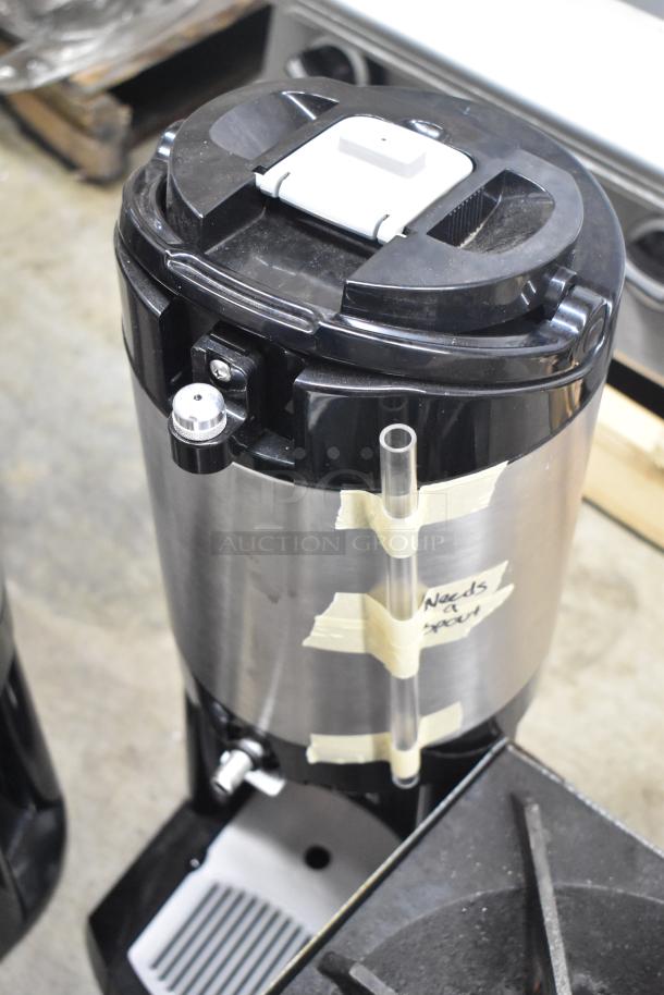 3 Fetco Luxus countertop beverage dispensers, stainless steel, labeled "Needs a spout," used condition.